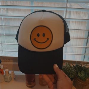 black smiley face hat from avatar nation